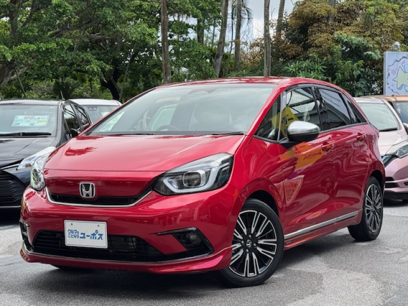 ホンダ フィット e:HEVリュクス　OP10年保証対象車　純正9インチナビ　ホンダセンシング　電動パーキング　前後ドラレコ