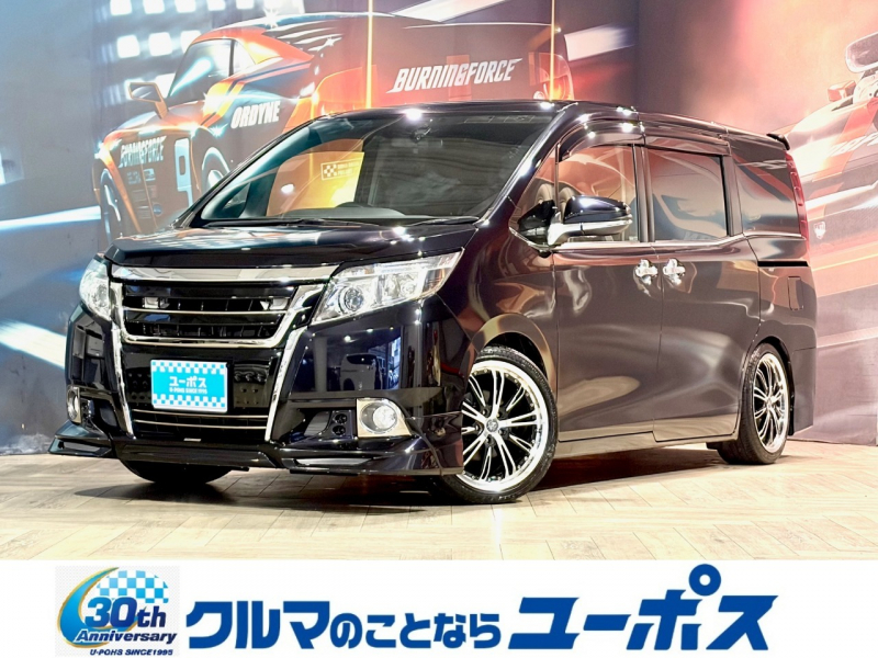 トヨタ エスクァイア Xi　トヨタ純正ナビ（フルセグTV／CD／DVD／Bluetooth）　TRDグリル　TRDフロントエアロ　バックカメラ　アルパインフリップダウンモニター　革巻きステアリング　ETC　パワースライドドア