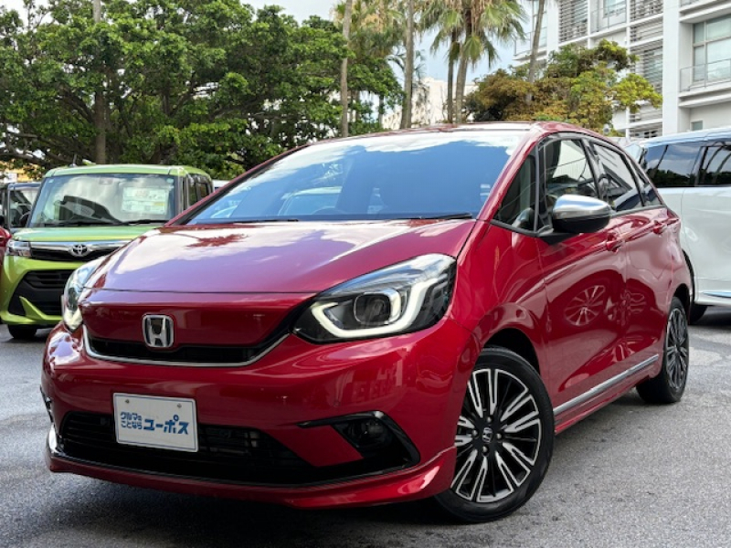 ホンダ フィット e:HEVリュクス　OP10年保証対象車　純正9インチナビ　ホンダセンシング　電動パーキング　前後ドラレコ